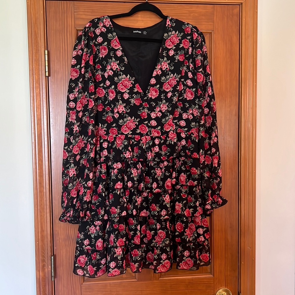 Worn once. Floral black mini dress. Long sleeve. Ruffle tier bottom. Size US 14
